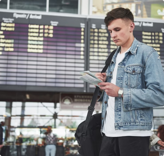 Young man checking his flight claim rights